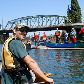 volunteers prepare to head out on kayaks