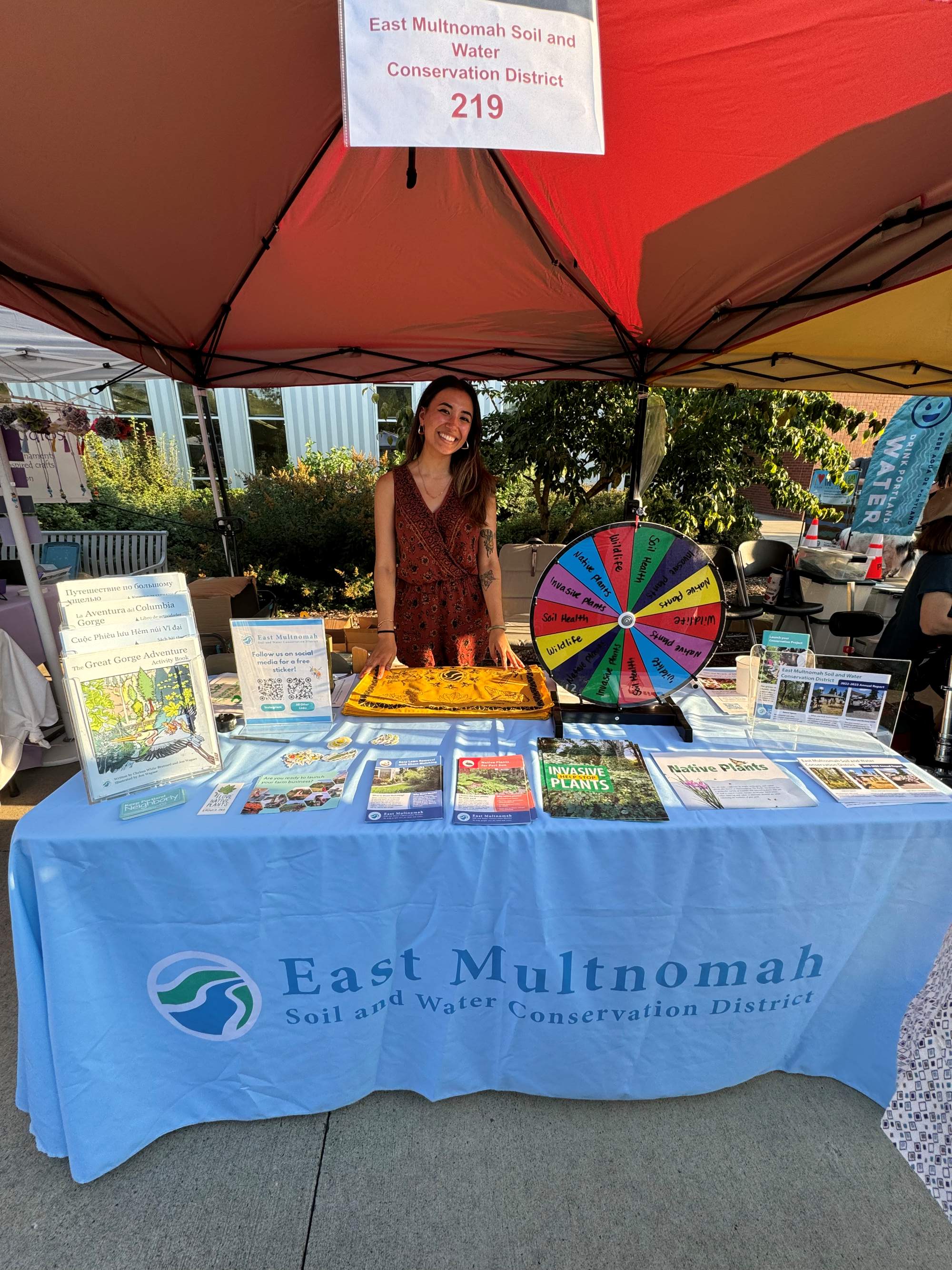 Jade from EMSWCD with a table at the Night Market